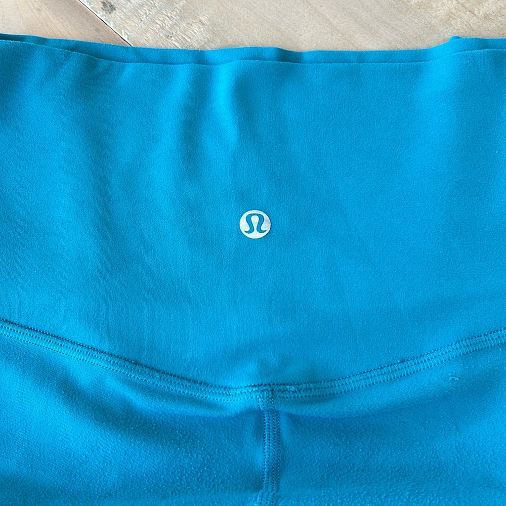 Lululemon wonder under teal size 4